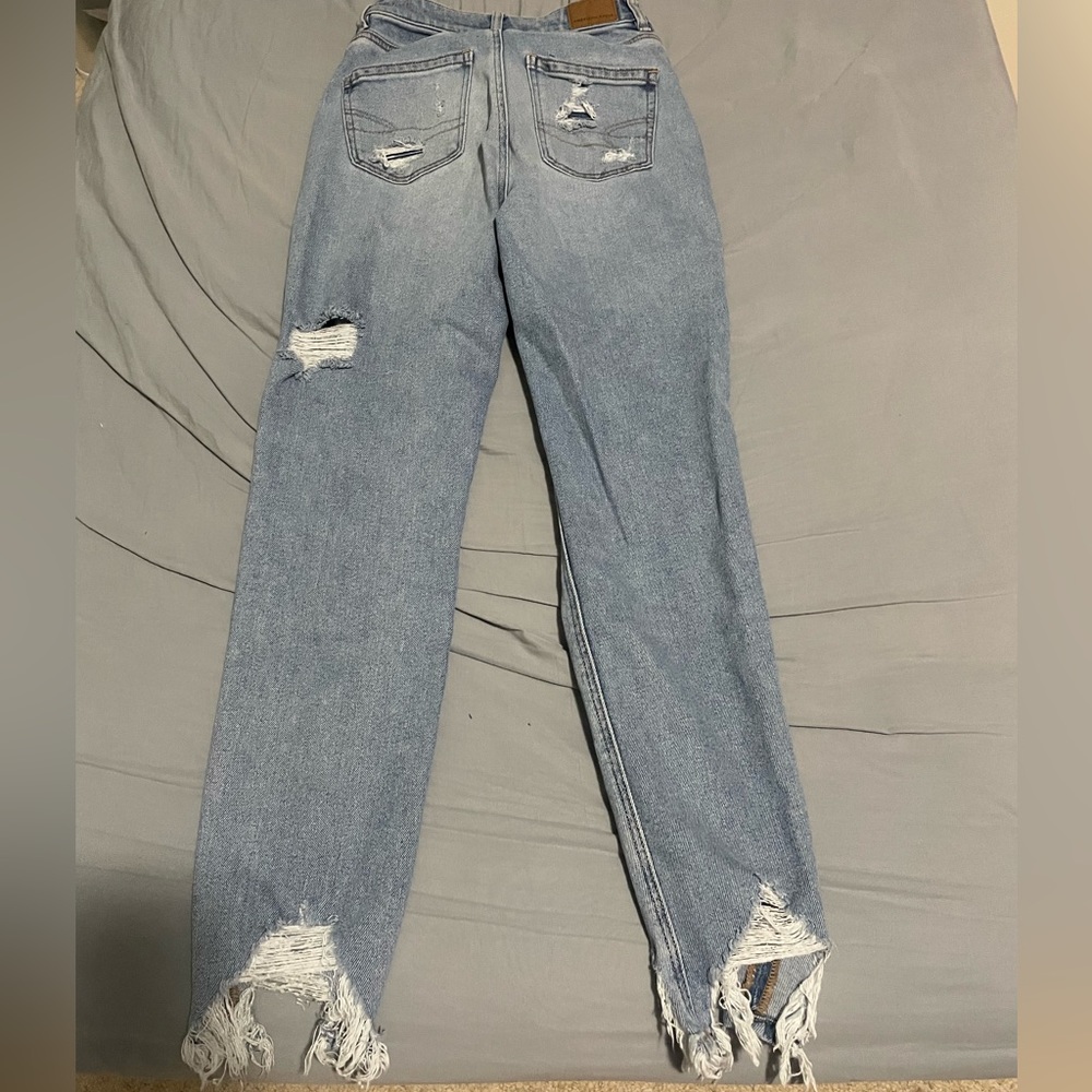 Size 23 jeans, light washed navy blue with ripped designs for summer and fall - Picture 2 of 2